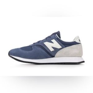 Men’s New Balance 420 sneakers. Worn a couple of times. In good shape.